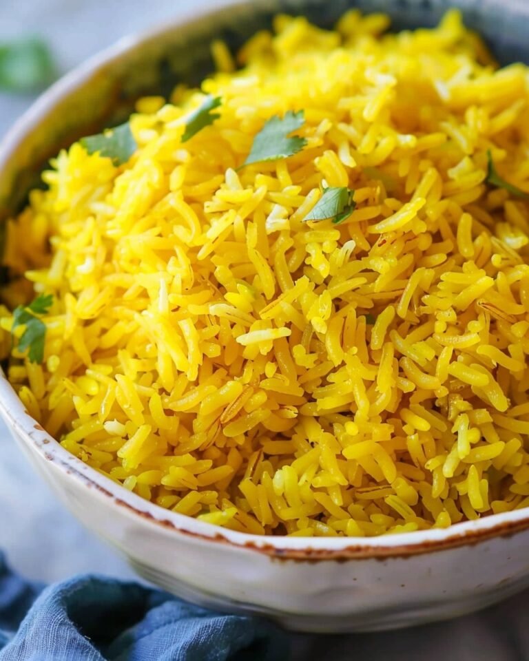 Indian yellow rice recipe with basmati, turmeric, and warm spices