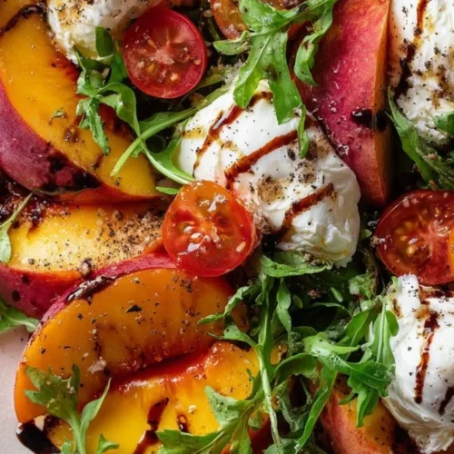 Peach Burrata Summer Salad with Fresh Herbs on a plate