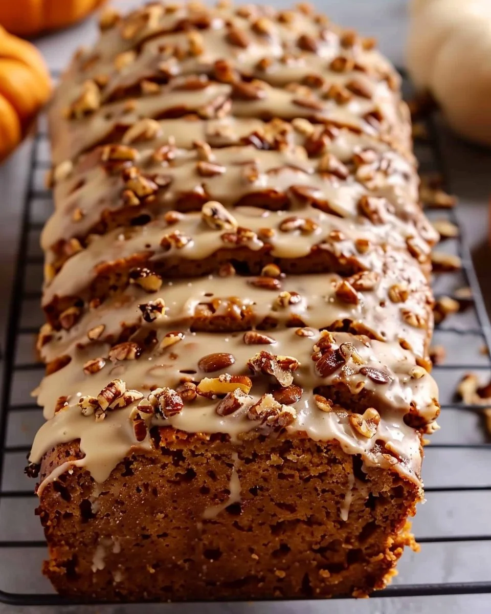 Delicious homemade pumpkin bread with spices and a golden crust.