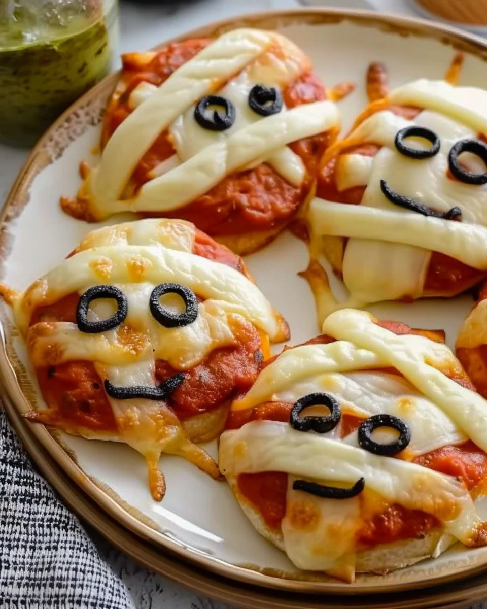 Mummy-themed pizza bites decorated for Halloween